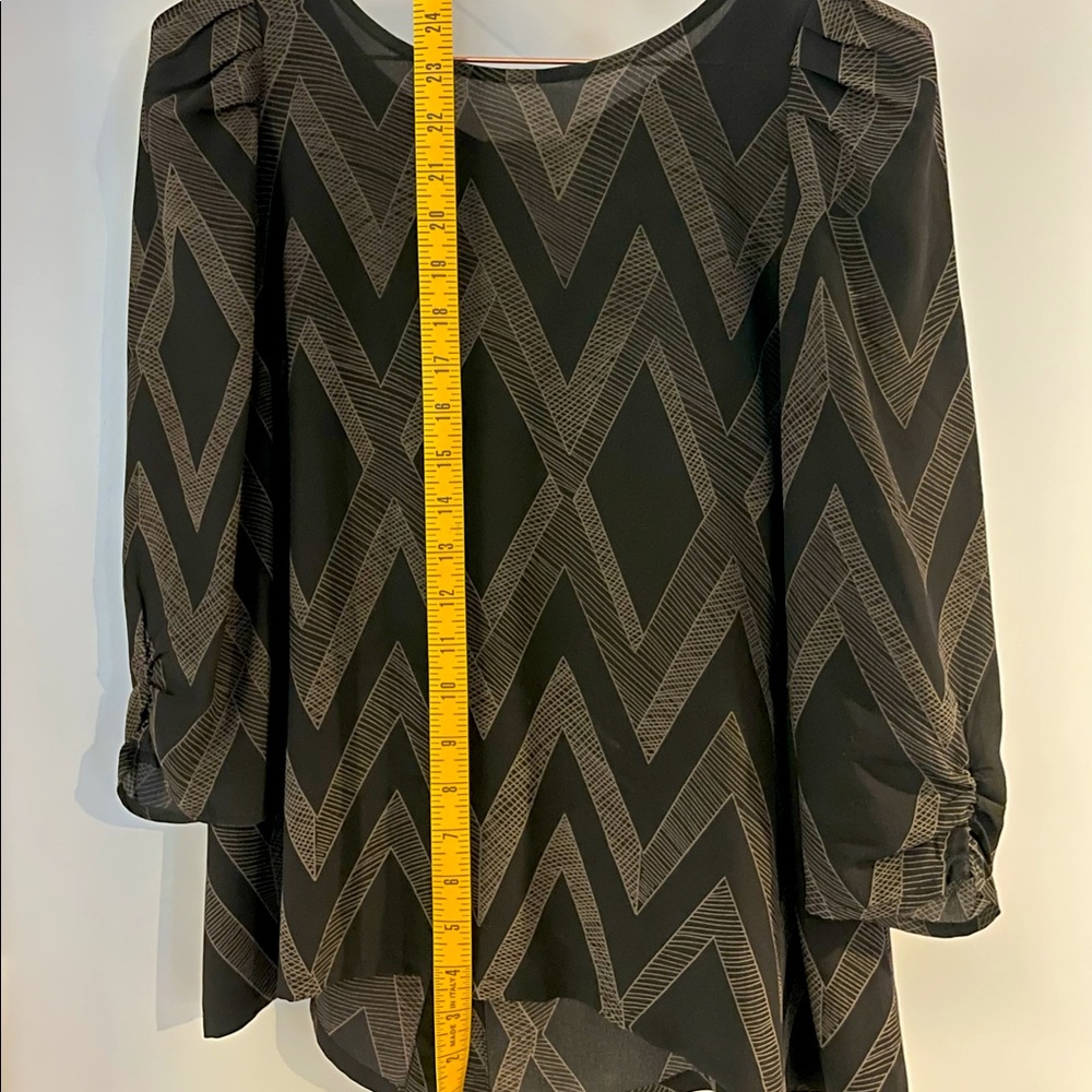 Black silk blouse with chevron pattern